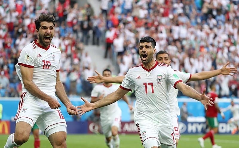 Morocco captain Medhi Benatia directs traffic during Group B play in Moscow.